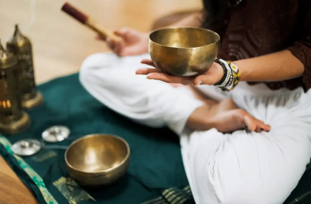 Person relaxing during Reiki healing therapy session Central Coast.